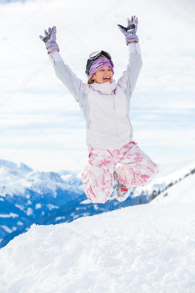 Young skier jumping