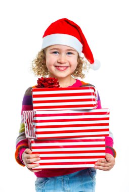 Hediye kutusu ile Noel Baba'nın şapkalı küçük kız