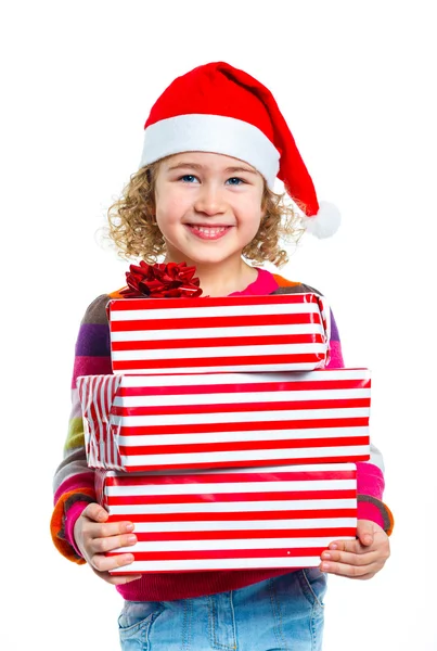 Kleines Mädchen mit Weihnachtsmütze und Geschenkbox — Stockfoto