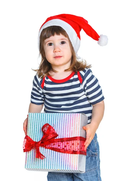 Κοριτσάκι με το καπέλο του Αϊ-Βασίλη με το κιβώτιο δώρων — Φωτογραφία Αρχείου