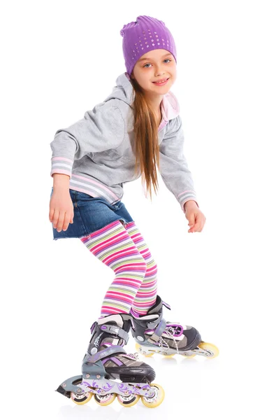 Милая девушка в роликовых коньках — стоковое фото
