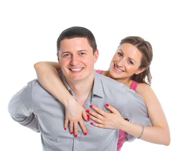 Portrait of a beautiful young happy smiling couple. Isolated white backround — Stock Photo, Image