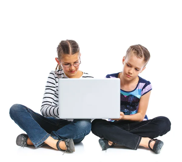 Pretty young girls with notebook — Stock Photo, Image