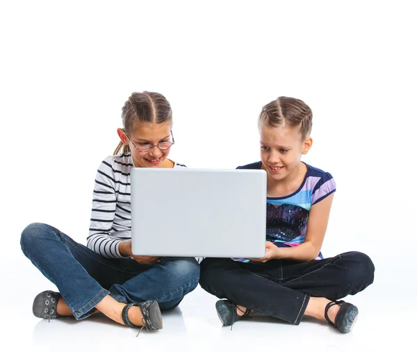 Pretty young girls with notebook — Stock Photo, Image