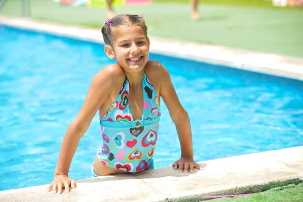 Girl in the pool — Stock Photo, Image