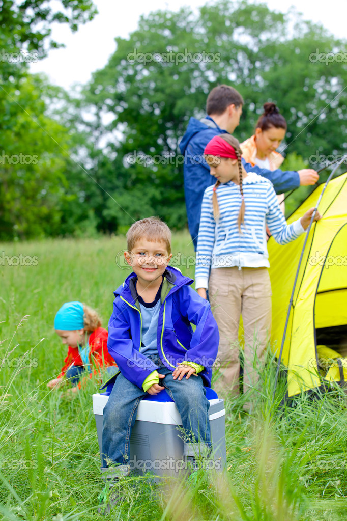 Young boy camping — Stock Photo © mac_sim 26385579