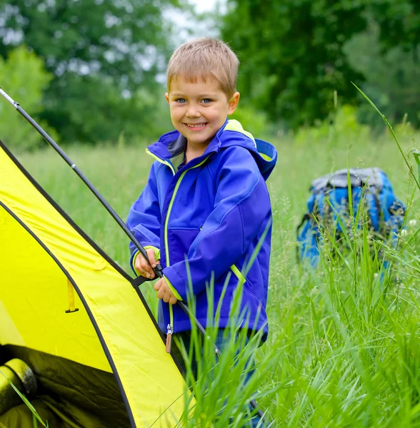 Young boy camping with tent — Stock Photo, Image