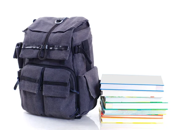 Backpack with book — Stock Photo, Image