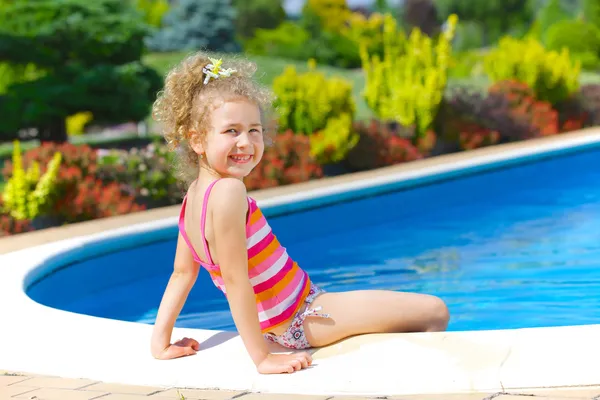 Girl in the pool — Stock Photo, Image