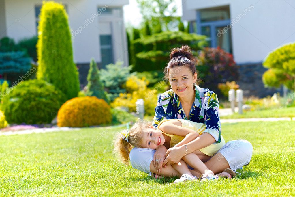 Family near new house — Stock Photo © mac_sim #27282483