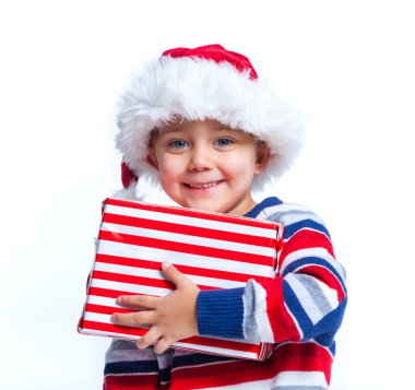 Noel Baba'nın şapkalı hediye kutusu ile küçük çocuk