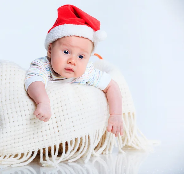 Baby in a santa suit. — Stock Photo, Image