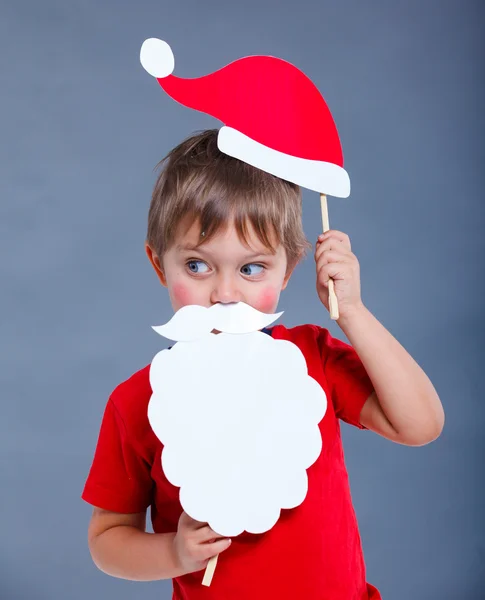 Little boy in Santa hat. Royalty Free Stock Images