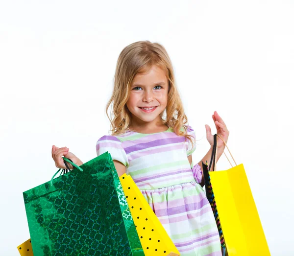 Meisje met boodschappentassen — Stockfoto