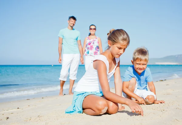 Family having fun on beach — Stock Photo, Image