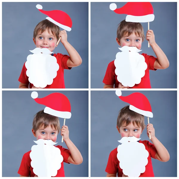 Kleine jongen in Kerstman hoed. — Stockfoto