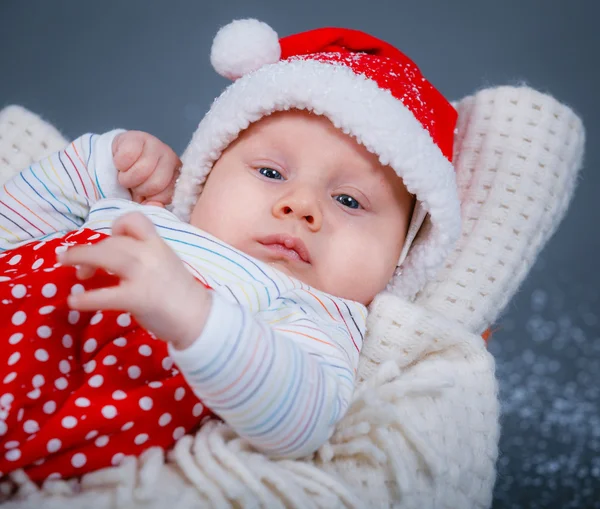 Baby in a santa suit. — Stock Photo, Image