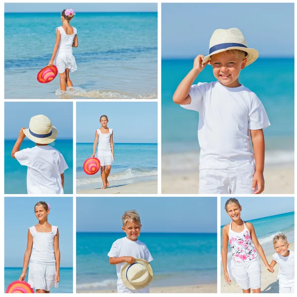 Junge und Mädchen mit Hut am Strand — Stockfoto