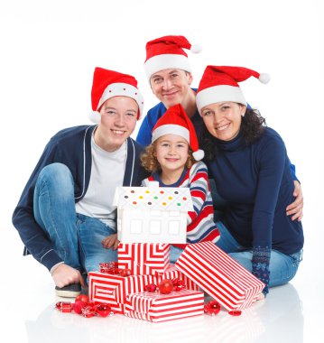 Noel Baba'nın şapka hediye kutusu ile ailede