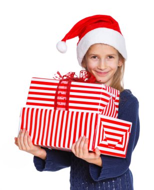 hediye kutusu ile Noel Baba şapkalı kız