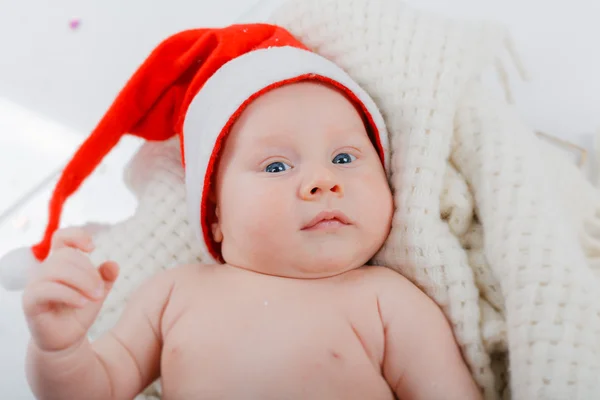 Baby in a santa suit. — Stock Photo, Image