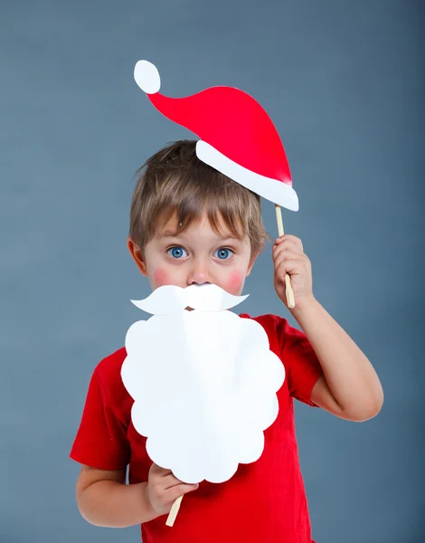 Маленький хлопчик у капелюсі Санта . — стокове фото