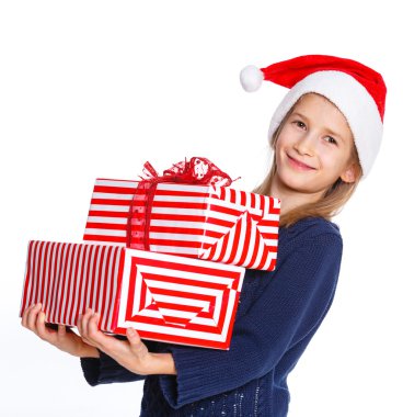hediye kutusu ile Noel Baba şapkalı kız