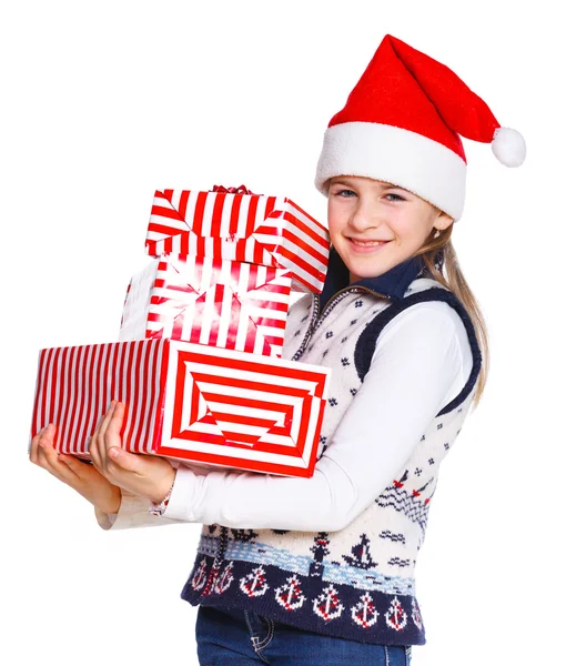 Menina no chapéu do Papai Noel com caixa de presente — Fotografia de Stock