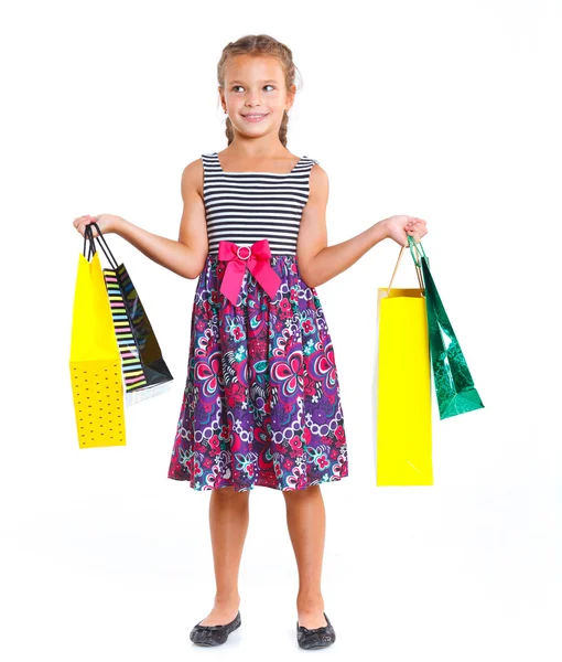Dívka s nákupními taškami — Stock fotografie