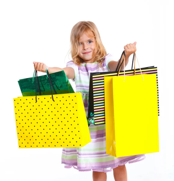 Κορίτσι με τσάντες για ψώνια Royalty Free Φωτογραφίες Αρχείου