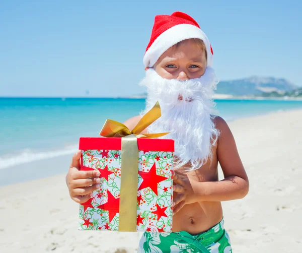 Niño en sombrero de santa —  Fotos de Stock