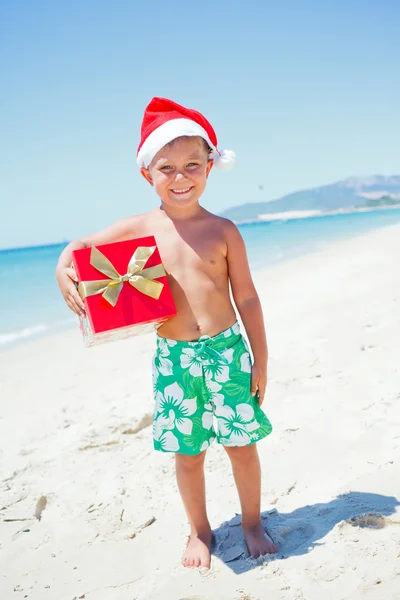 Niño en sombrero de santa —  Fotos de Stock