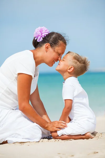 Mother and son having fun on the beach — Stock Photo, Image
