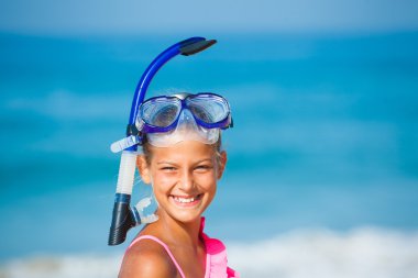 Happy girl on beach clipart
