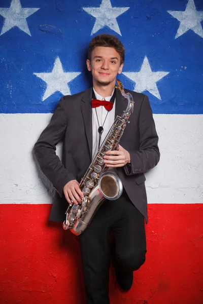 Muž s saxofon — Stock fotografie
