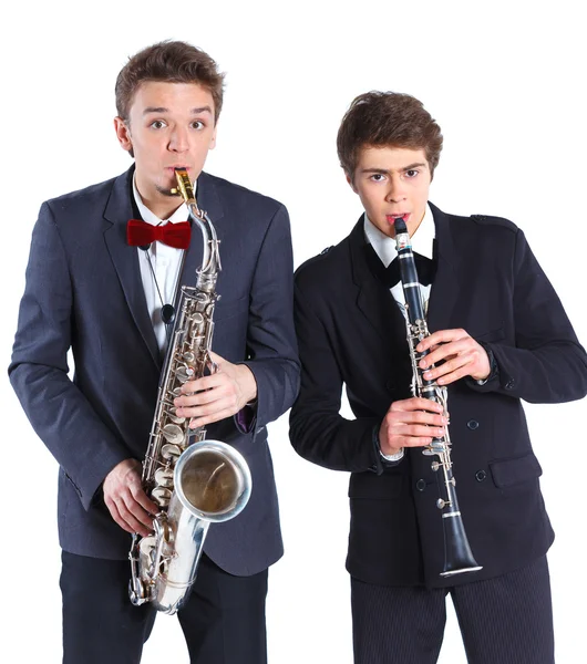 Мальчики с саксофоном и кларнетом — стоковое фото