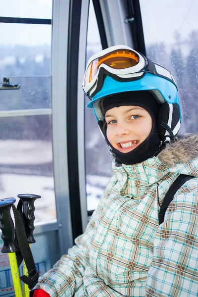 Skier girl on ski lift — Stock Photo, Image