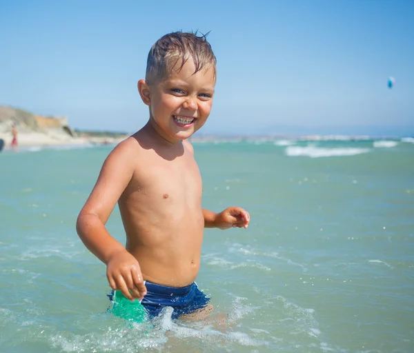 Cute boy on the beach — Stock Photo, Image