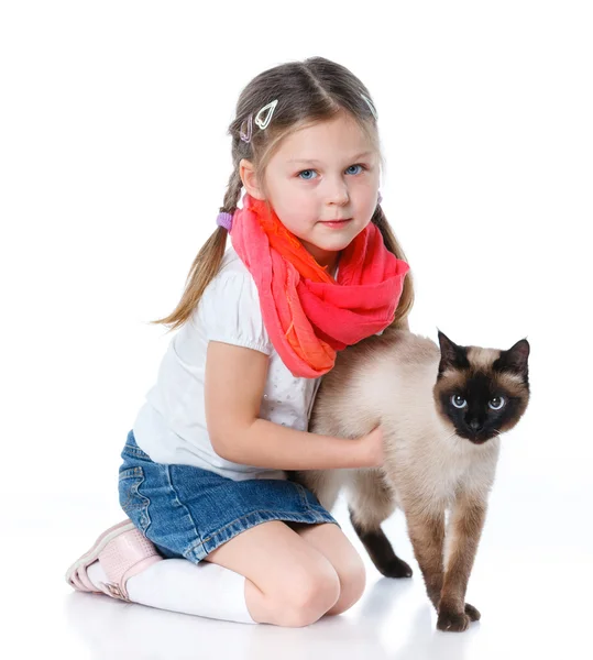 Маленькая девочка и кошка — стоковое фото