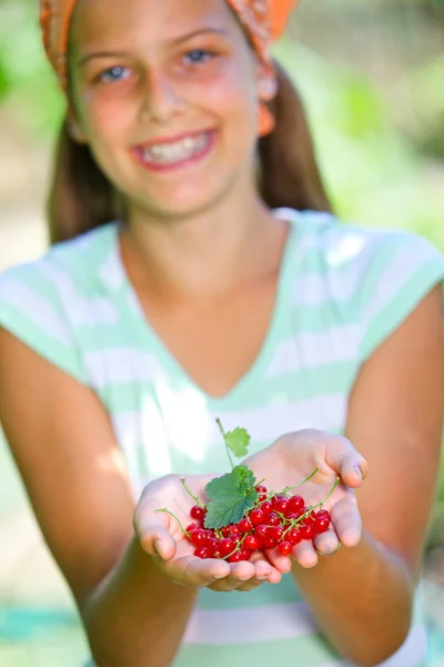 Girl with red currant. — Stock Photo, Image