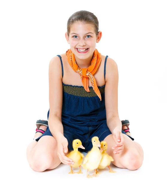 Girl with cute ducklings — Stock Photo, Image