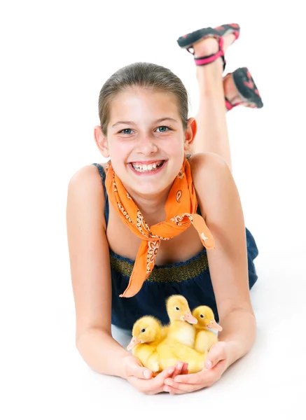 Girl with cute ducklings — Stock Photo, Image