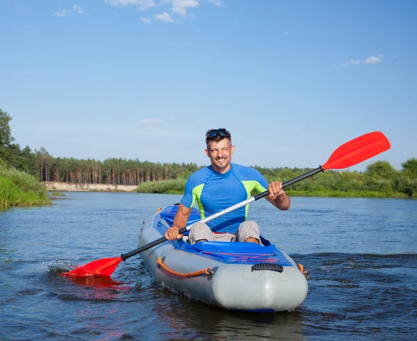 Young man kayaking — Stock Photo, Image