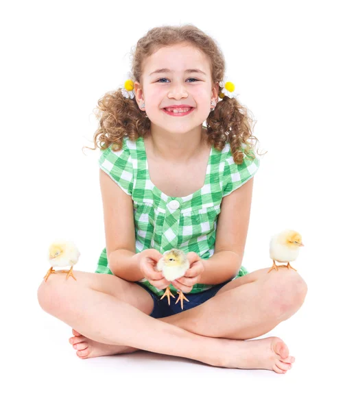 Happy little girl with chickens — Stock Photo, Image