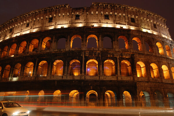 Roman Colosseum illuminated at night