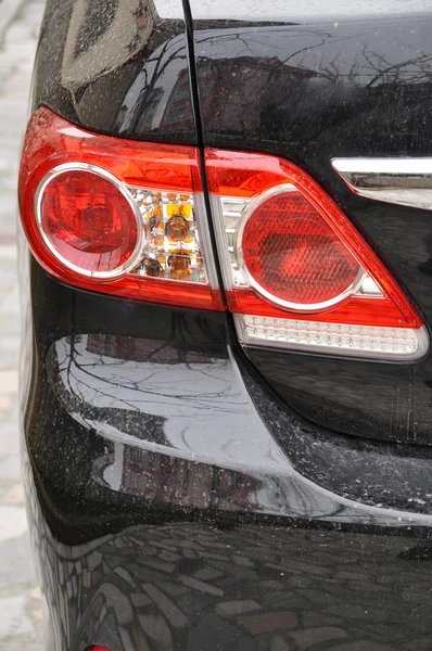 Black car and rear lamps — Stock Photo, Image
