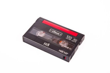 Small old black MiniDV format video cassette, isolated on white background clipart