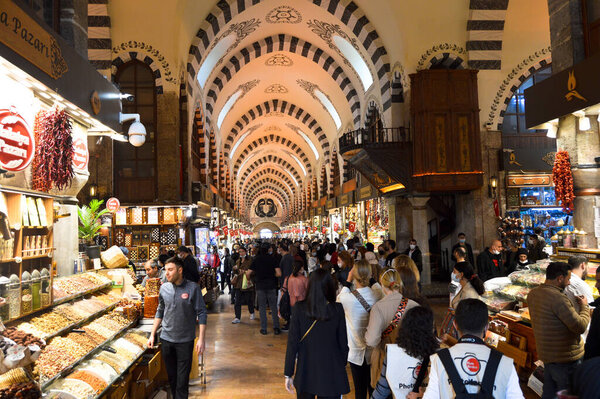 In the Misir Carsisi built in the 17th century, locals and tourists from various countries of the world are shopping. Istanbul Turkey, november 06 2021