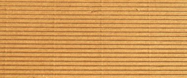 Kahverengi ve bej işlemeli karton, arka plan için çok uygun.