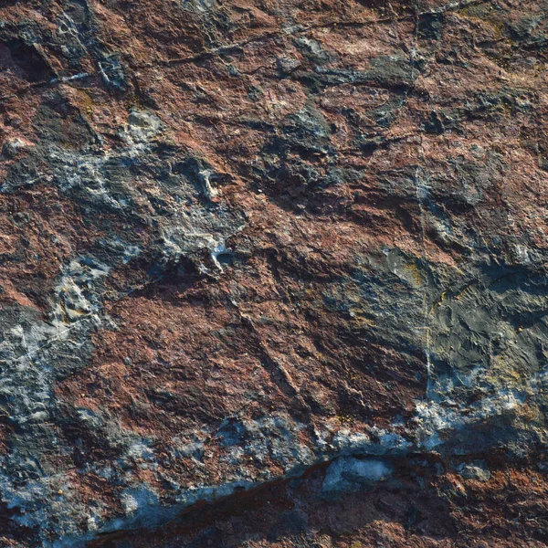 Çok sert kaya dokusu, doğal mavi ve kırmızı taş dokusu, arkaplan veya duvar kağıdı